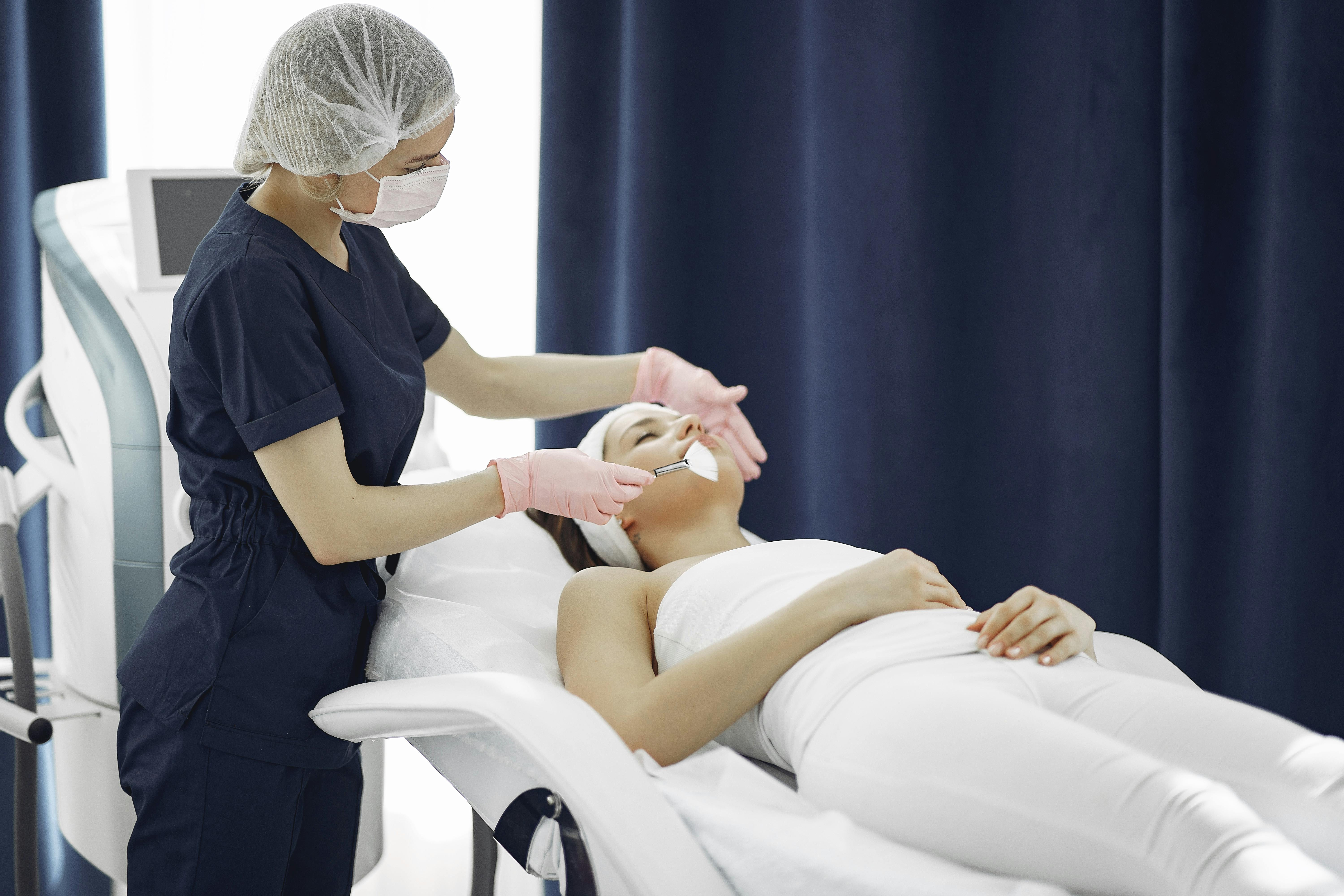 A professional facial treatment in a modern spa room